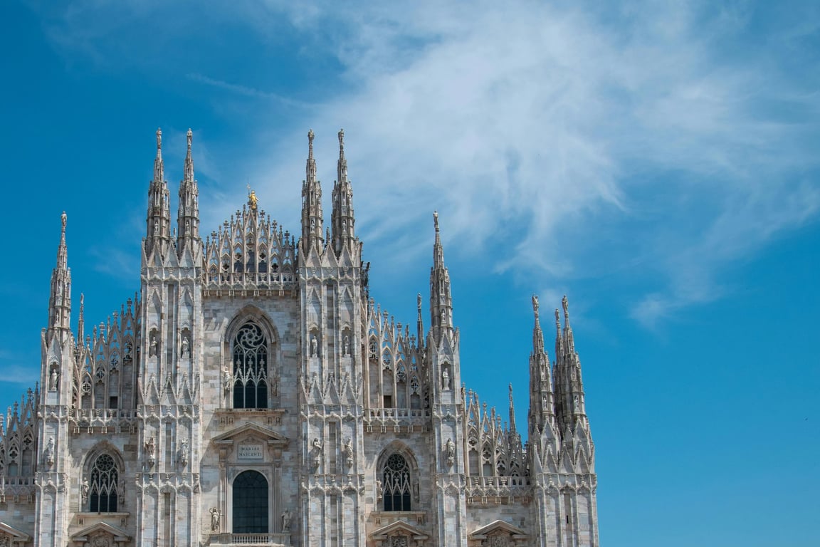 AI remove color from image before photo - gothic cathedral with bright blue sky