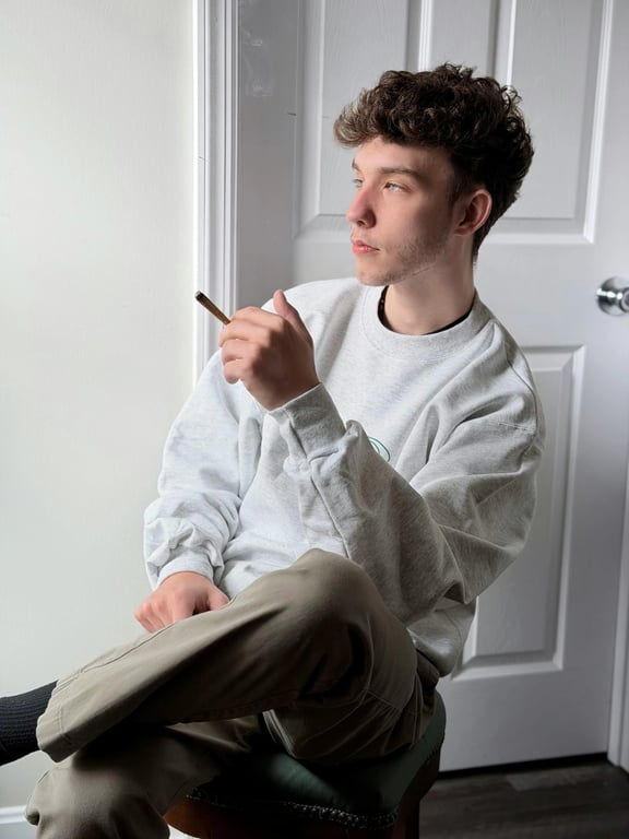 a portrait of a man edited in a clean Korean short haircut style, so that all hair is cut short and straight, with the top slightly longer than the sides following Korean salon proportions, no fringe covering the forehead, no curls or waves, a clearly defined hairline, and unchanged face and original lighting
