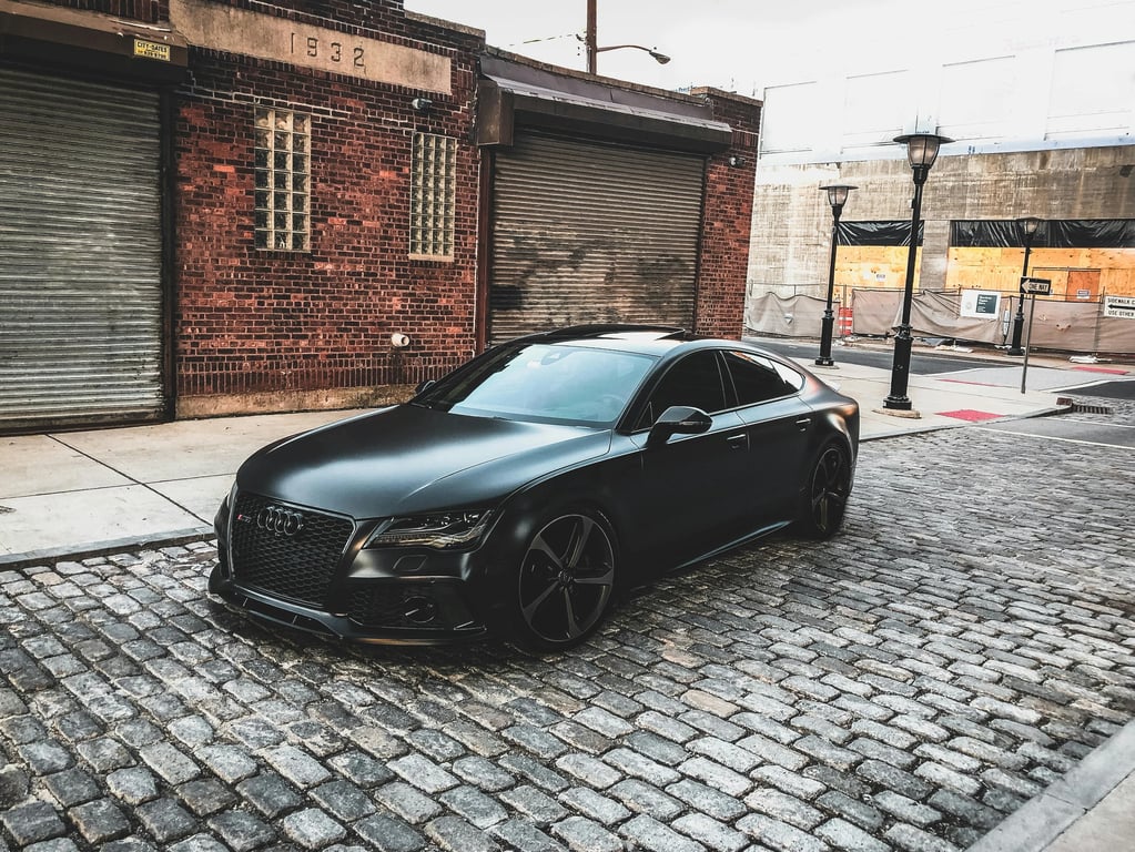 AI anime car sticker before photo - black car on the street