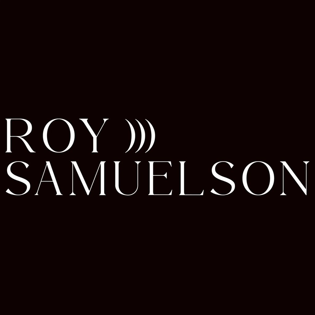 Text Roy Samuelson, three end parentheses near his first name.