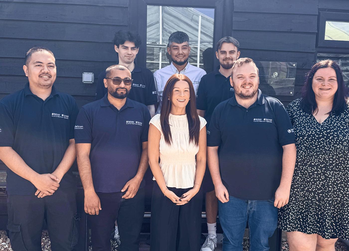 A photo of the Bellcom team outside the office in Wallington | Bellcom
