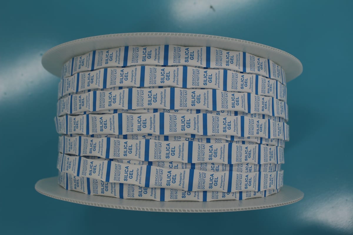 Rolls of printed silica gel desiccant sachet packaging