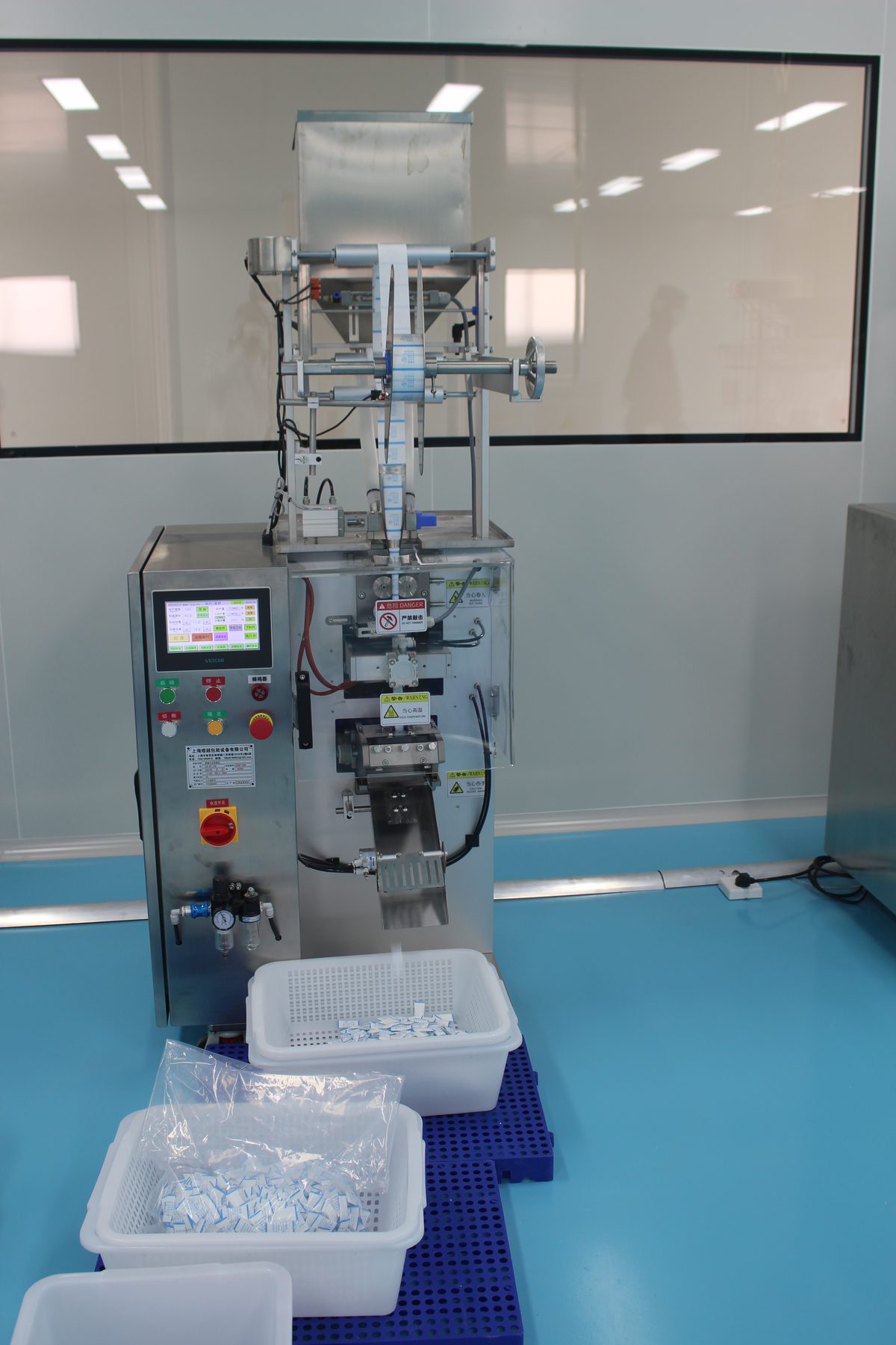 Desiccant packet production machine in the workshop