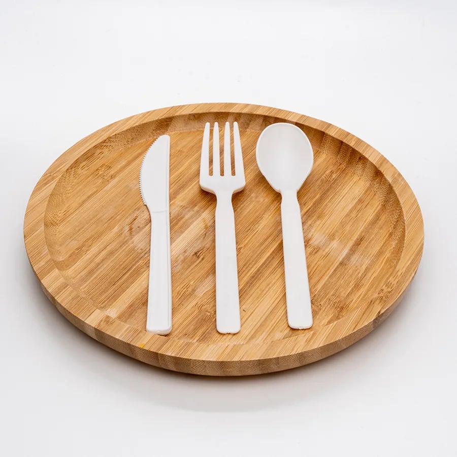 White CPLA knife, fork, and spoon presented as a coordinated meal-service set
