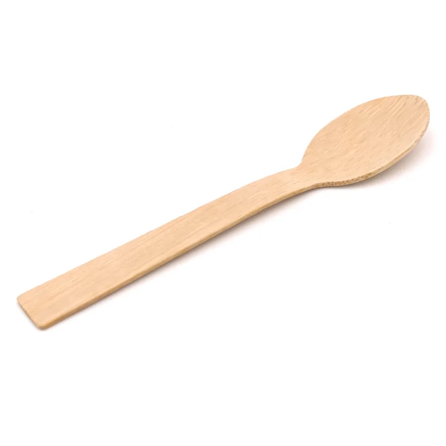 Close studio view of a natural bamboo spoon