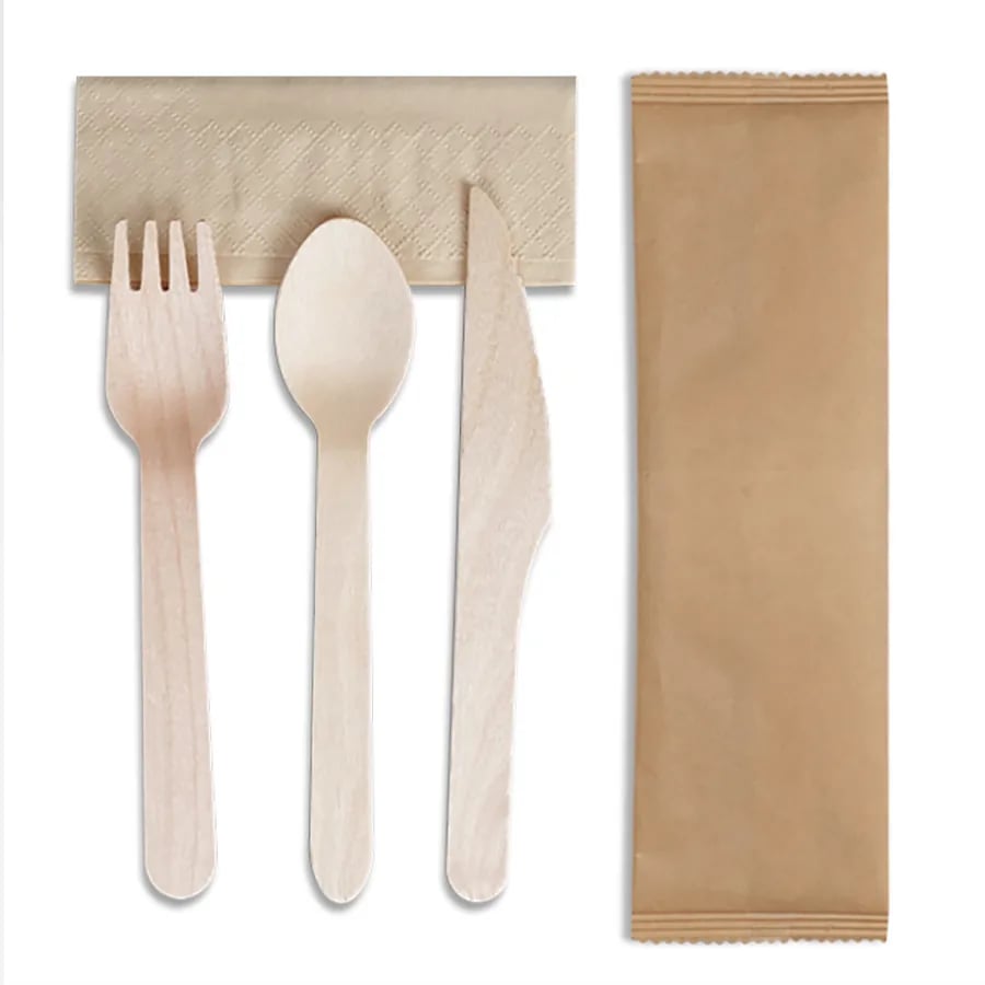 Wood cutlery set shown with a plain kraft pouch and napkin