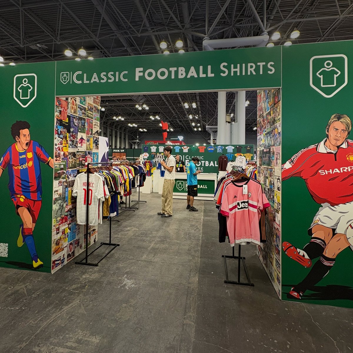 Fans interacting with football shirts at a live event