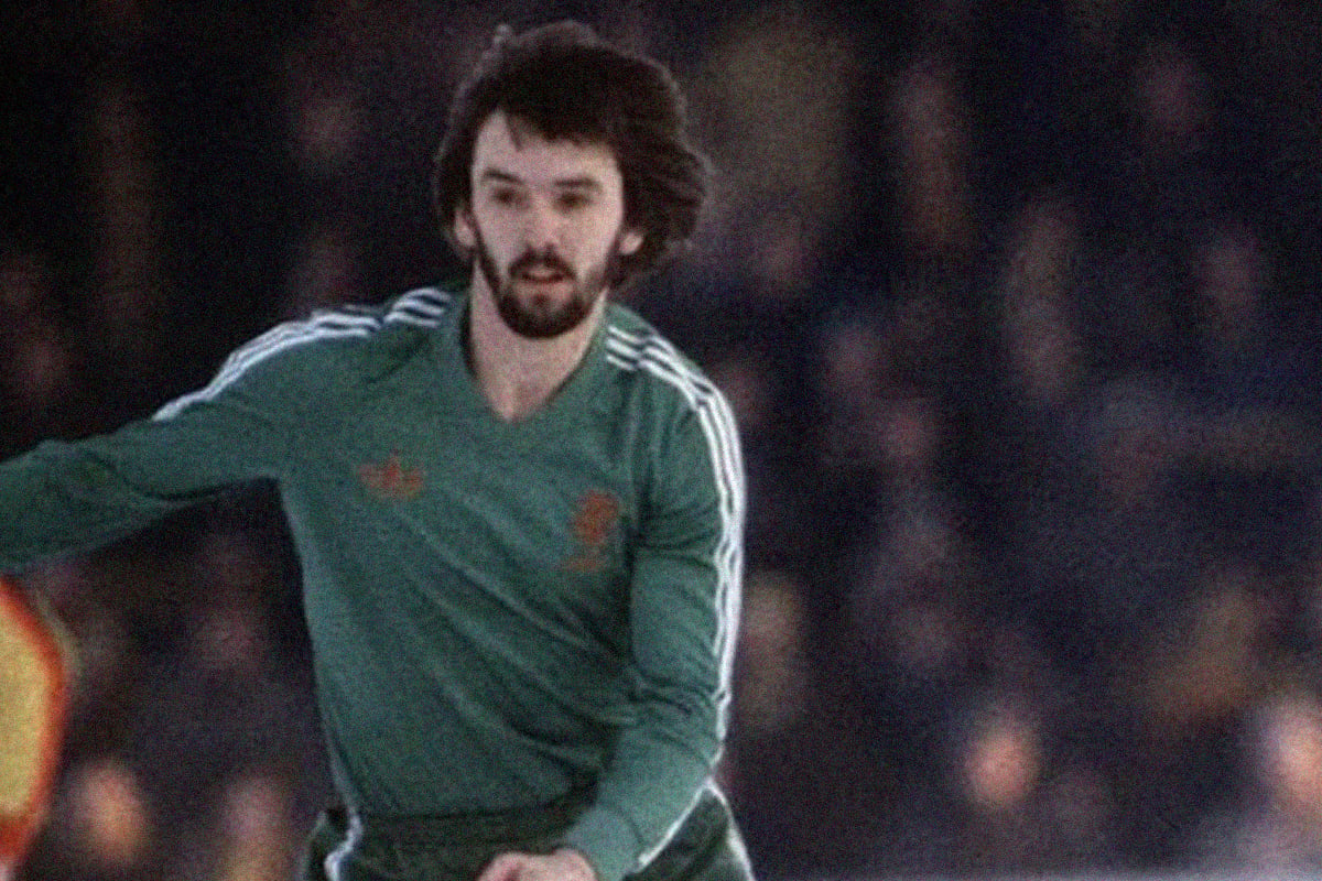 Phil Neale wearing Green Away