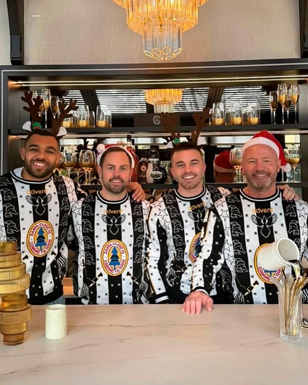 Customer wearing a Christmas Jumper
