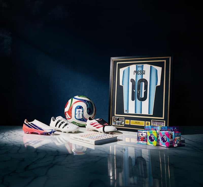 Grand Prize: Messi signed shirt, classic shirts store credit, Adidas boots and Topps bundle