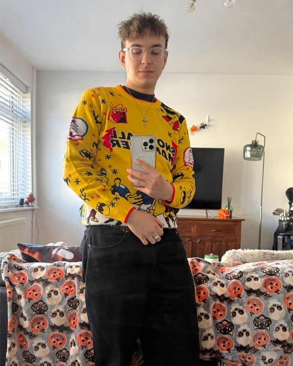 Customer wearing a Christmas Jumper