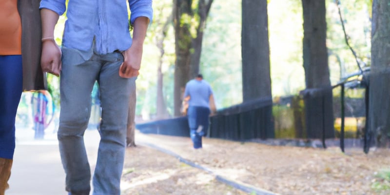 Couple walking through Central Park