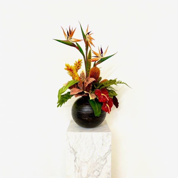 Tropical Flowers In Black Vase