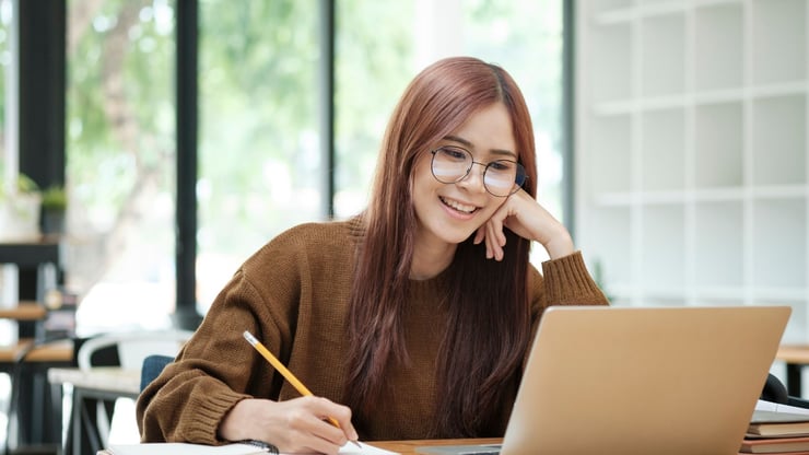 Student Studying with Laptop