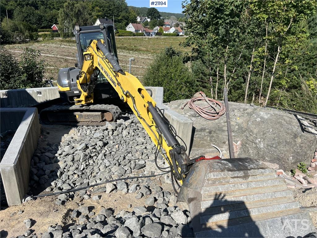 New Holland E55B excavator w/ digging bucket, sanding bucket, 2012 21194 E55B excavator w/ digging bucket, sanding bucket,...
