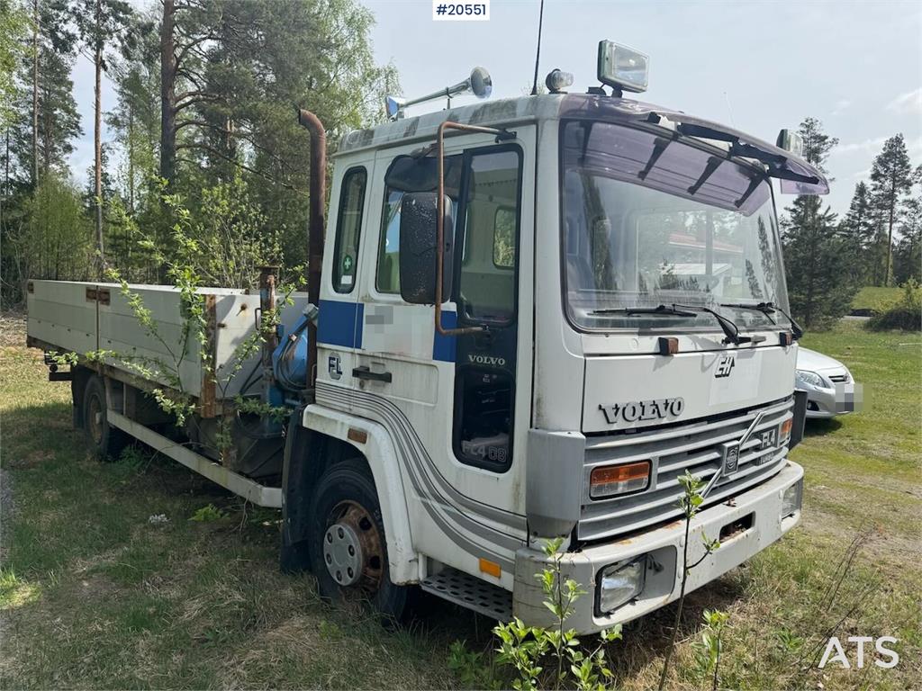 Volvo FL4 Flatbed Truck with HMF Crane – Sold as a Repai 1987 20551 FL4 Flatbed Truck with HMF Crane – Sold as a Repai 198...