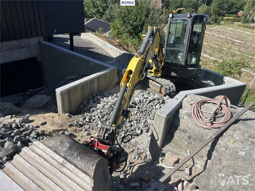 New Holland E55B excavator w/ digging bucket, sanding bucket, 2012 21194 E55B excavator w/ digging bucket, sanding bucket,...