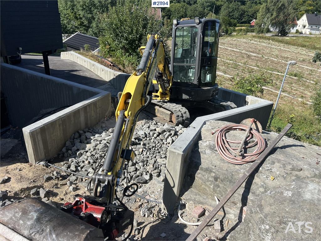 New Holland E55B excavator w/ digging bucket, sanding bucket, 2012 21194 E55B excavator w/ digging bucket, sanding bucket,...