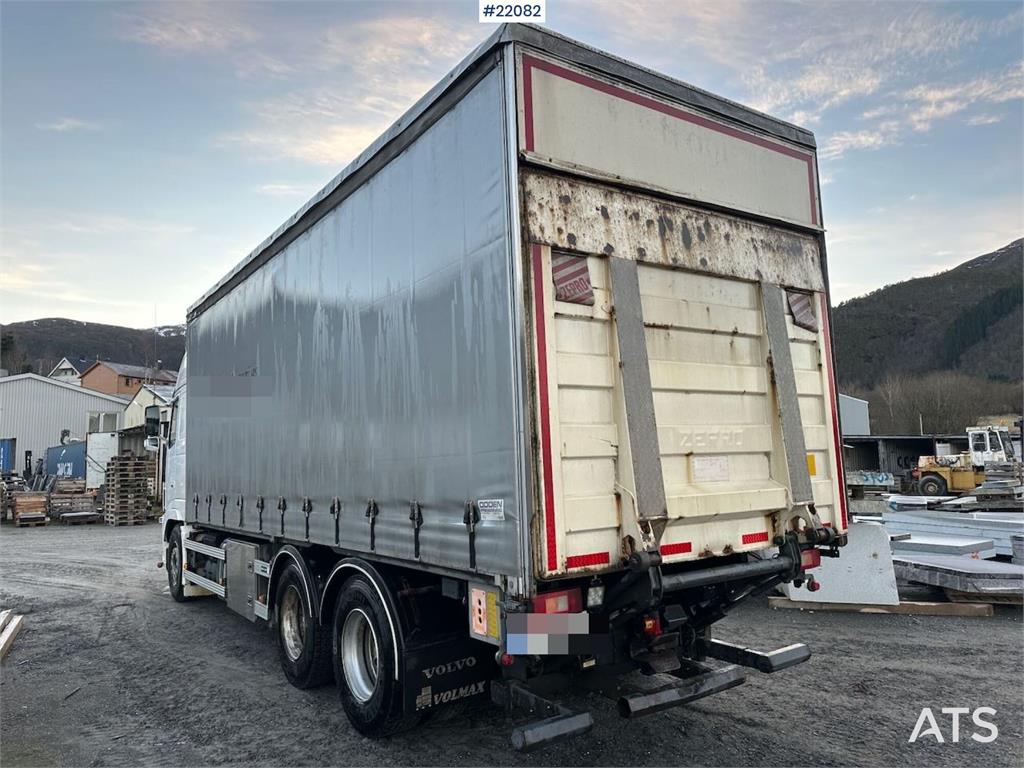 Volvo FH16 700 Tandem Box Truck with Lift and Onspot 2011 22082 FH16 700 Tandem Box Truck with Lift and Onspot 2011 1 imag...