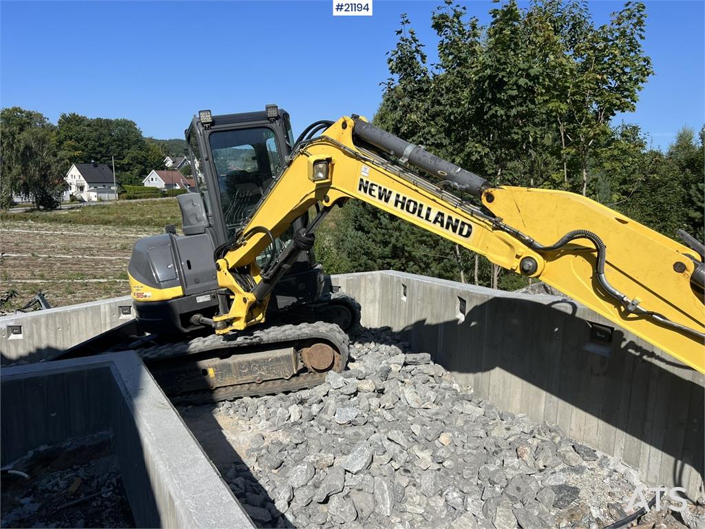 New Holland E55B excavator w/ digging bucket, sanding bucket, 2012 21194 E55B excavator w/ digging bucket, sanding bucket,...