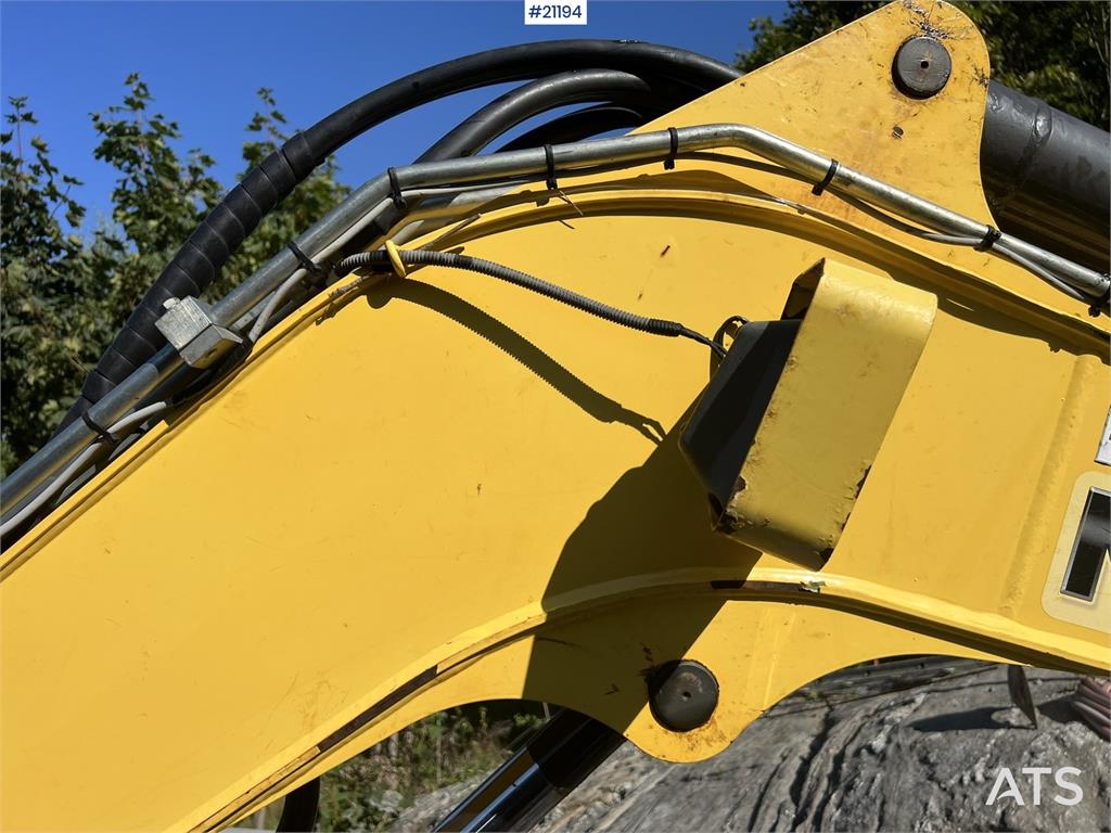 New Holland E55B excavator w/ digging bucket, sanding bucket, 2012 21194 E55B excavator w/ digging bucket, sanding bucket,...