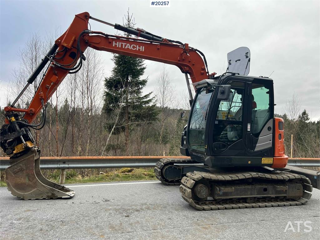 Hitachi zx85us-6 excavator w/ rototilt, sanding bucket, di 2022 20257 zx85us-6 excavator w/ rototilt, sanding bucket, di 2...