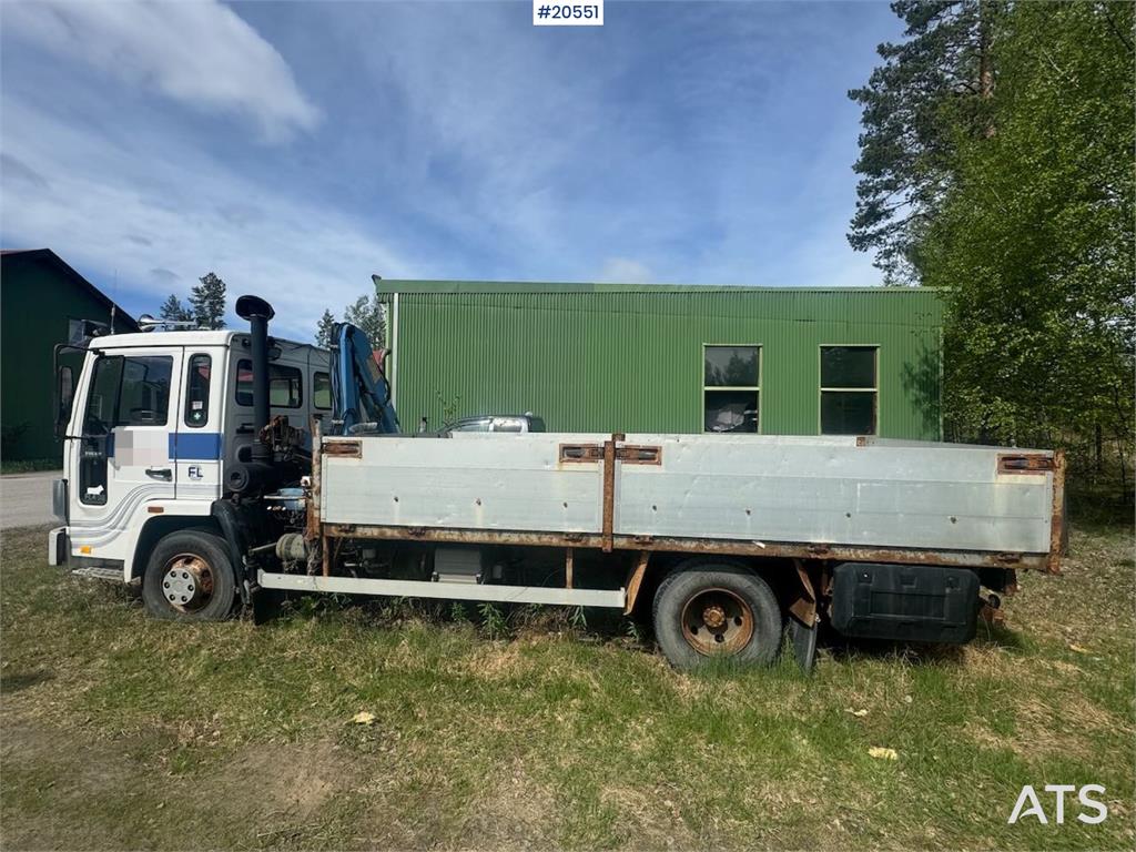 Volvo FL4 Flatbed Truck with HMF Crane – Sold as a Repai 1987 20551 FL4 Flatbed Truck with HMF Crane – Sold as a Repai 198...
