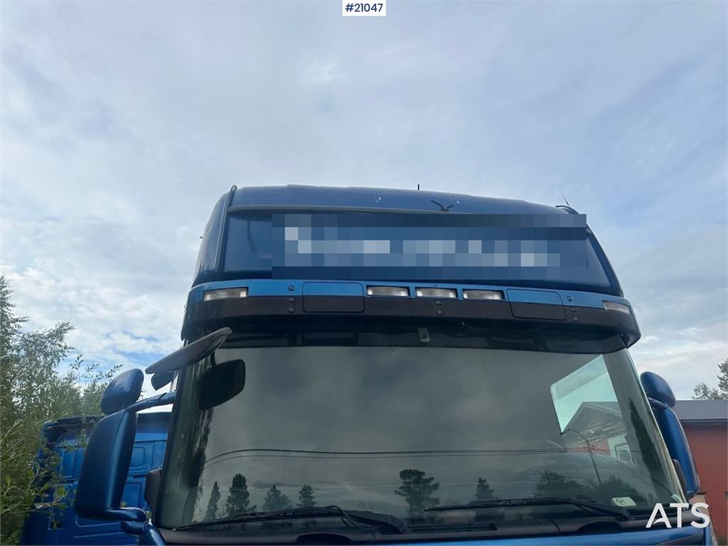 Scania R500 container truck w/ lift and replaced engine. 2005 21047 R500 container truck w/ lift and replaced engine. 2005...