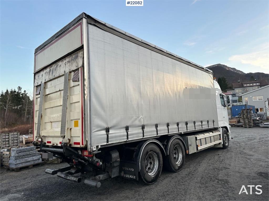Volvo FH16 700 Tandem Box Truck with Lift and Onspot 2011 22082 FH16 700 Tandem Box Truck with Lift and Onspot 2011 1 imag...