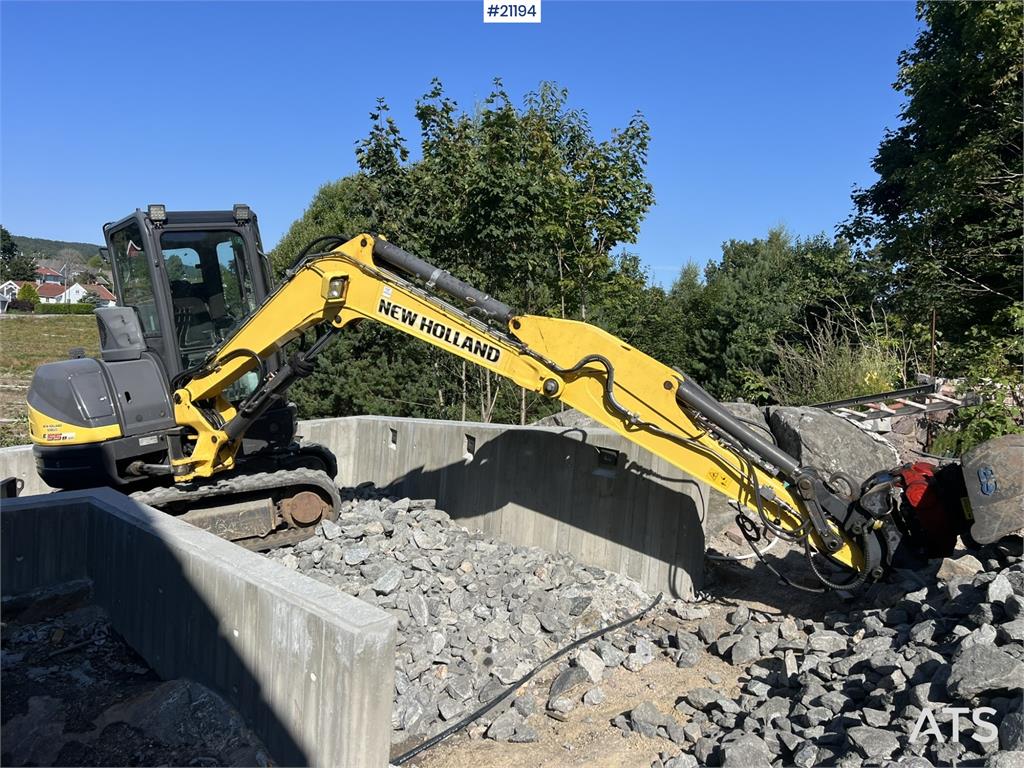 New Holland E55B excavator w/ digging bucket, sanding bucket, 2012 21194 E55B excavator w/ digging bucket, sanding bucket,...