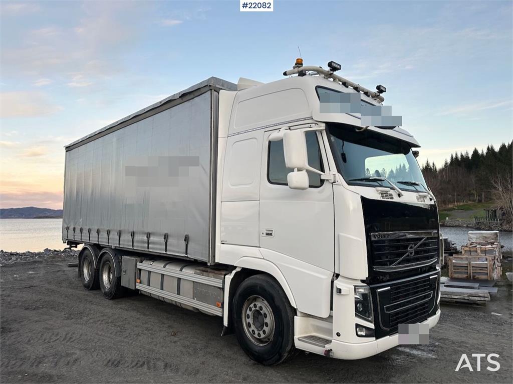 Volvo FH16 700 Tandem Box Truck with Lift and Onspot 2011 22082 FH16 700 Tandem Box Truck with Lift and Onspot 2011 1 imag...