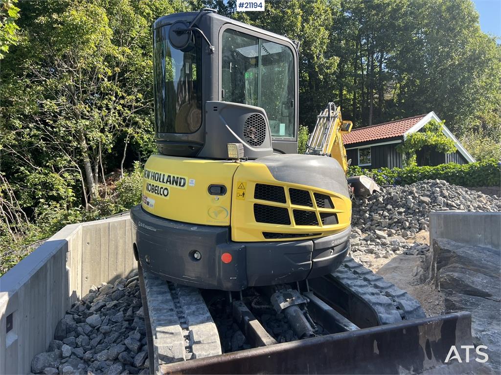 New Holland E55B excavator w/ digging bucket, sanding bucket, 2012 21194 E55B excavator w/ digging bucket, sanding bucket,...