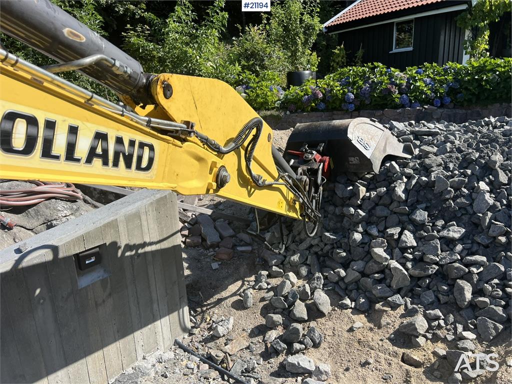 New Holland E55B excavator w/ digging bucket, sanding bucket, 2012 21194 E55B excavator w/ digging bucket, sanding bucket,...