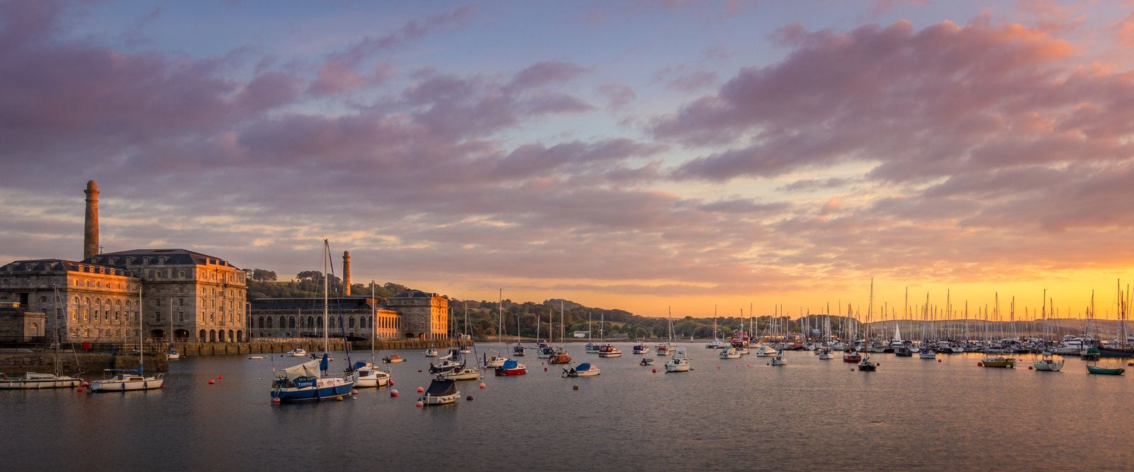 Royal William Yard and the waterfront in Plymouth at sunset