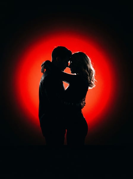CASAL DE NAMORADOS COM UM BRILHO VERMELHO AO FUNDO 03