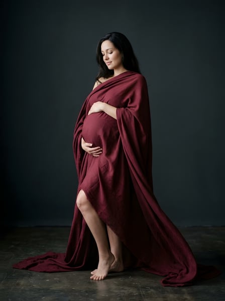 Mulher grávida segurando o barriga 17