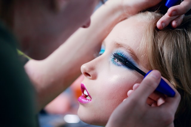 Eye makeup applied to transgender persona