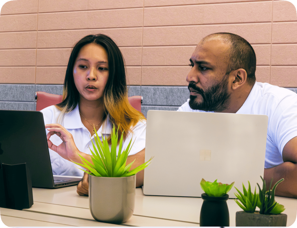 Prostrive team members working on innovative projects together