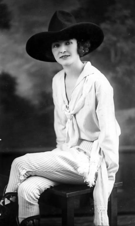 Mabel Strickland Woodward with her horse — pioneer cowgirl and rodeo champion, early twentieth century
