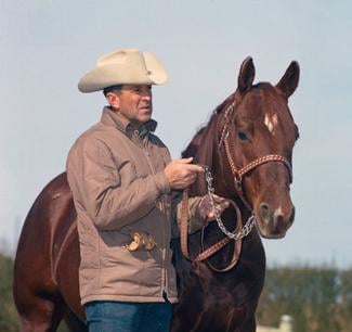 Matlock Rose with a chestnut horse at the Matlock Rose Ranch, Gainesville, Texas