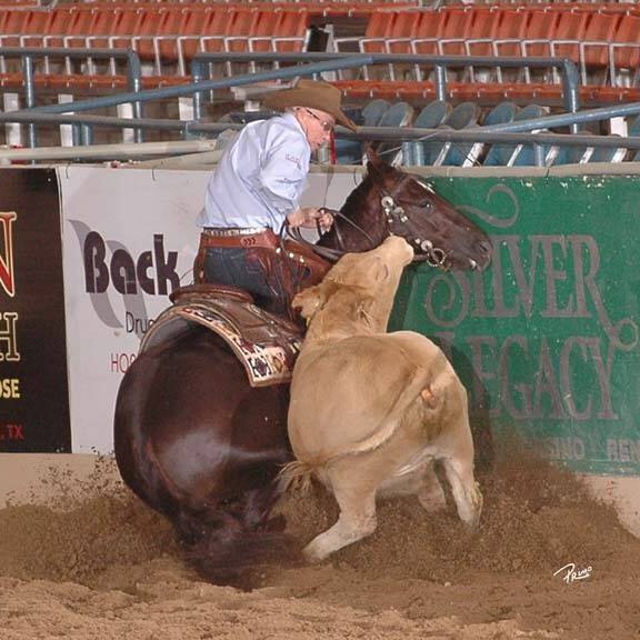 Todd Crawford working a cow at the Silver Legacy – NRCHA competition