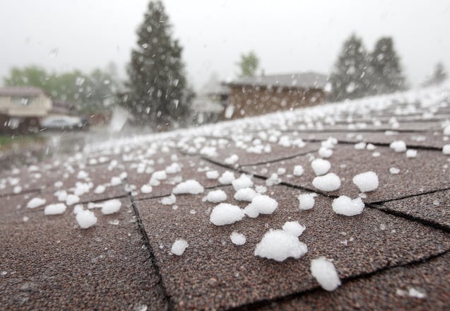 Trinity assessing hail damage on a commercial roof in Colorado