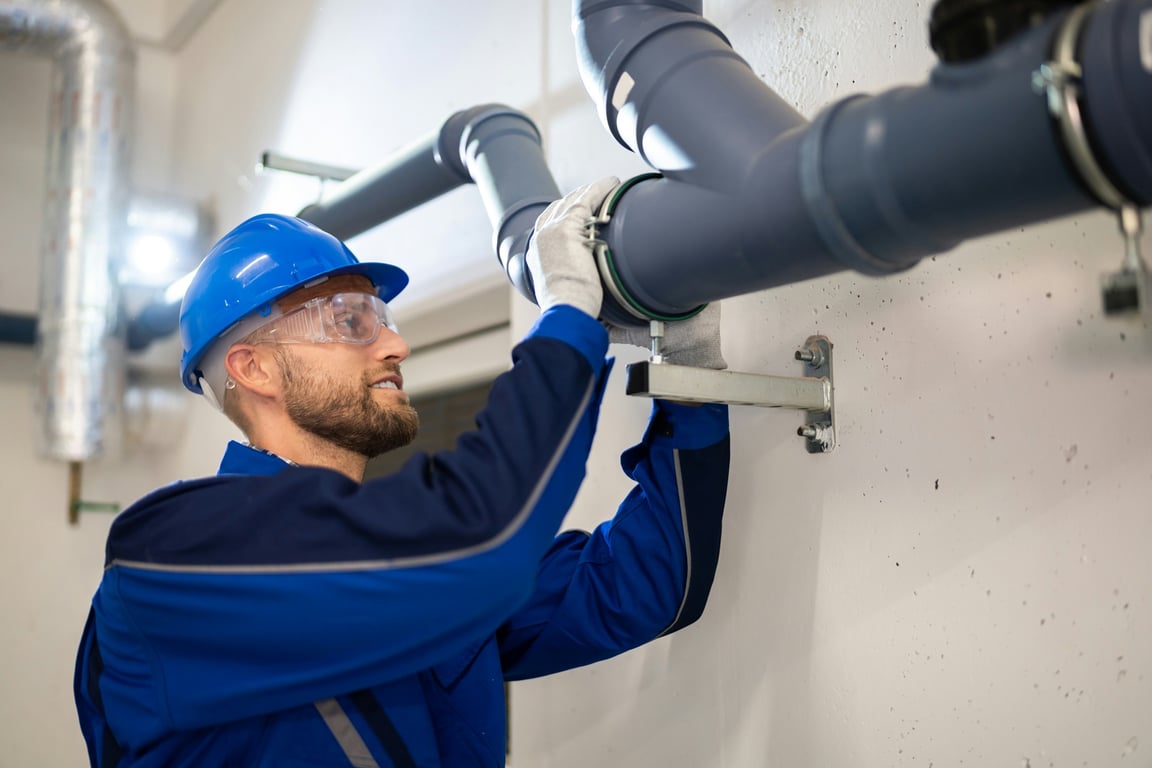 Plumber on the job