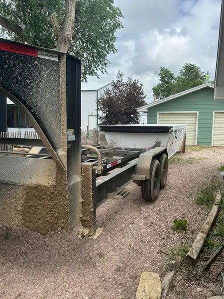 Roll off dumpster delivered to a construction site