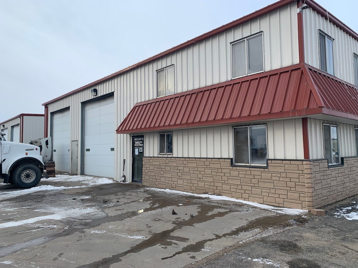 Photo of Quality Trucks shop.