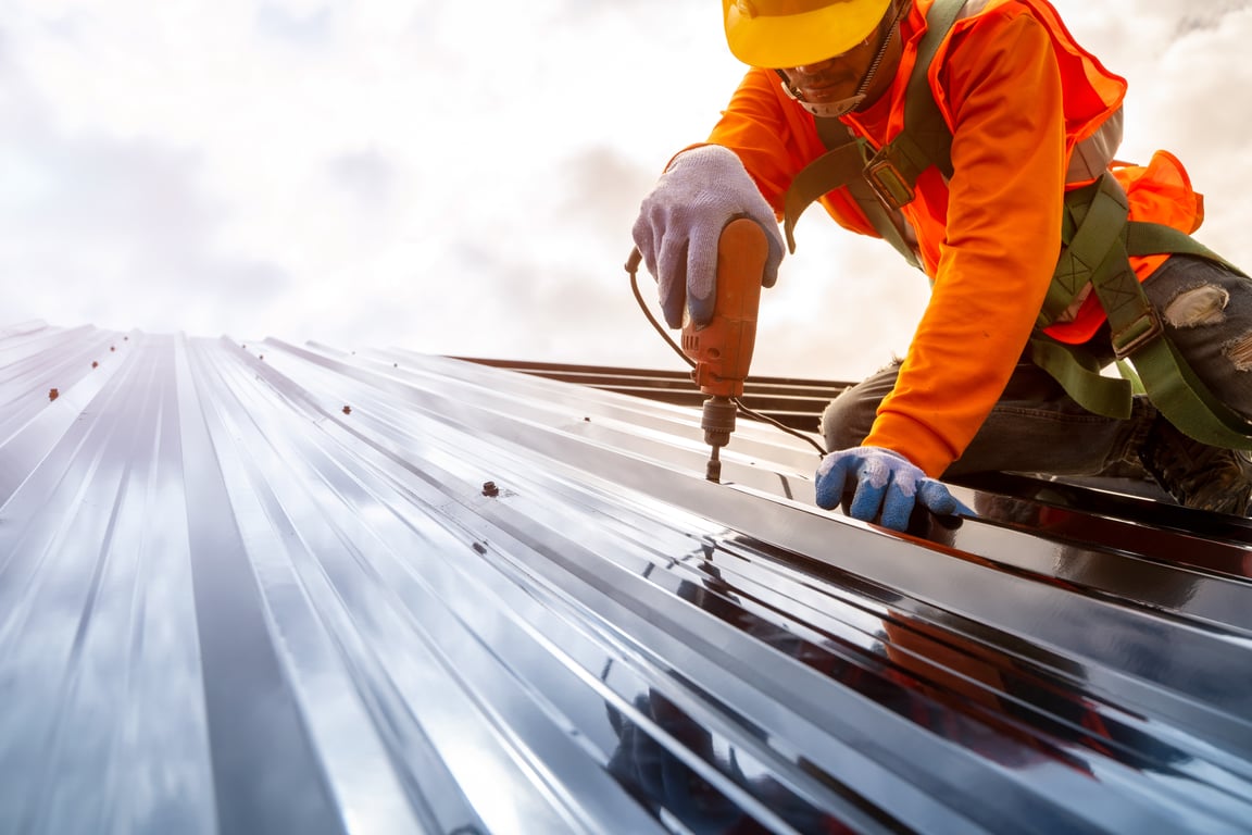 Trinity Construction Services crew on a commercial roofing project in Colorado
