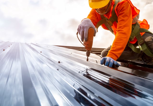 Trinity Construction Services crew on a commercial roofing project in Colorado