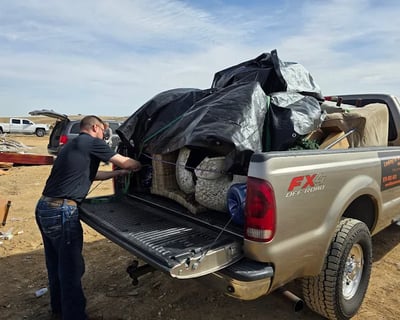 86it! junk removal crew loading a truck in Loveland, CO