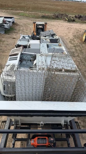 Old appliances being removed from a home