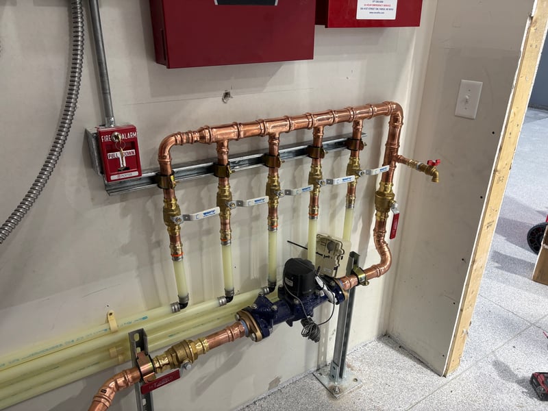 DB Plumbing technician repairing plumbing